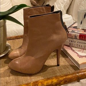Tan leather high heeled booties with back zipper